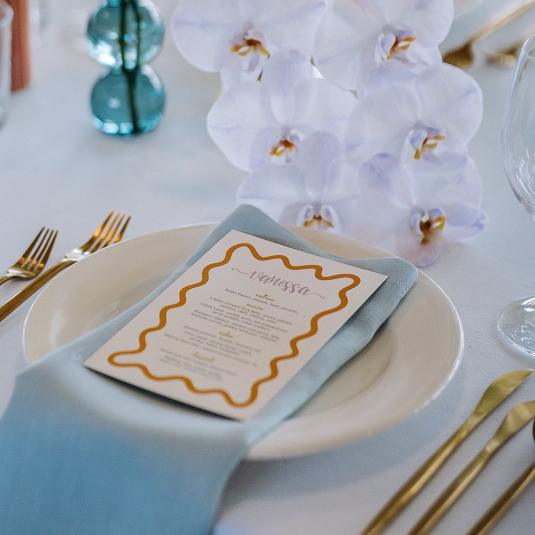 Beautiful place card & menu design on table by Class Ink Designs